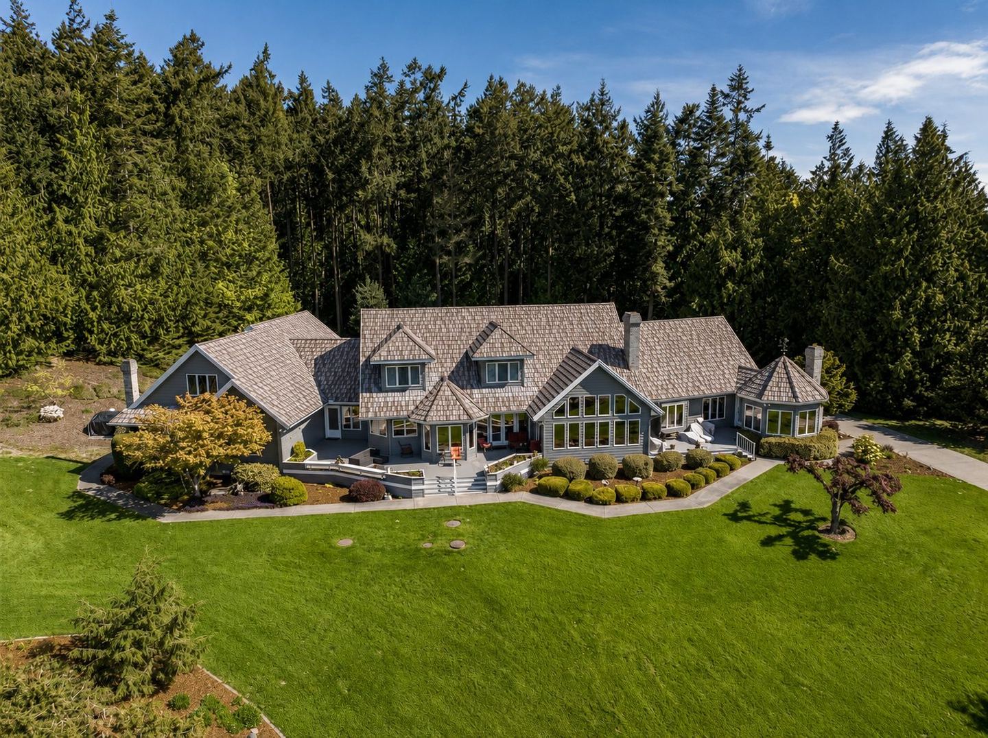 Aerial view of a South Sound estate with guest house and barn