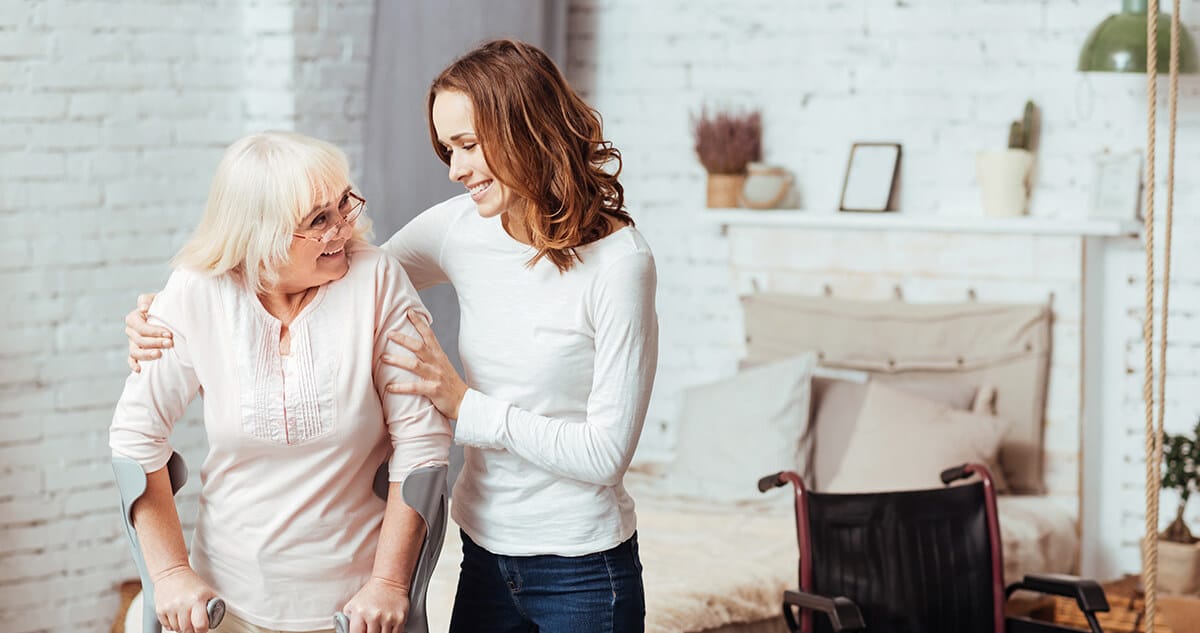 Two ladies talking inside a home